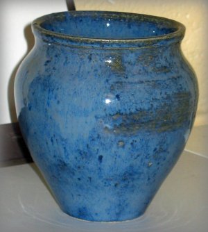White stoneware vase with Dark Cloud Spectrum Glaze, made in our studio.